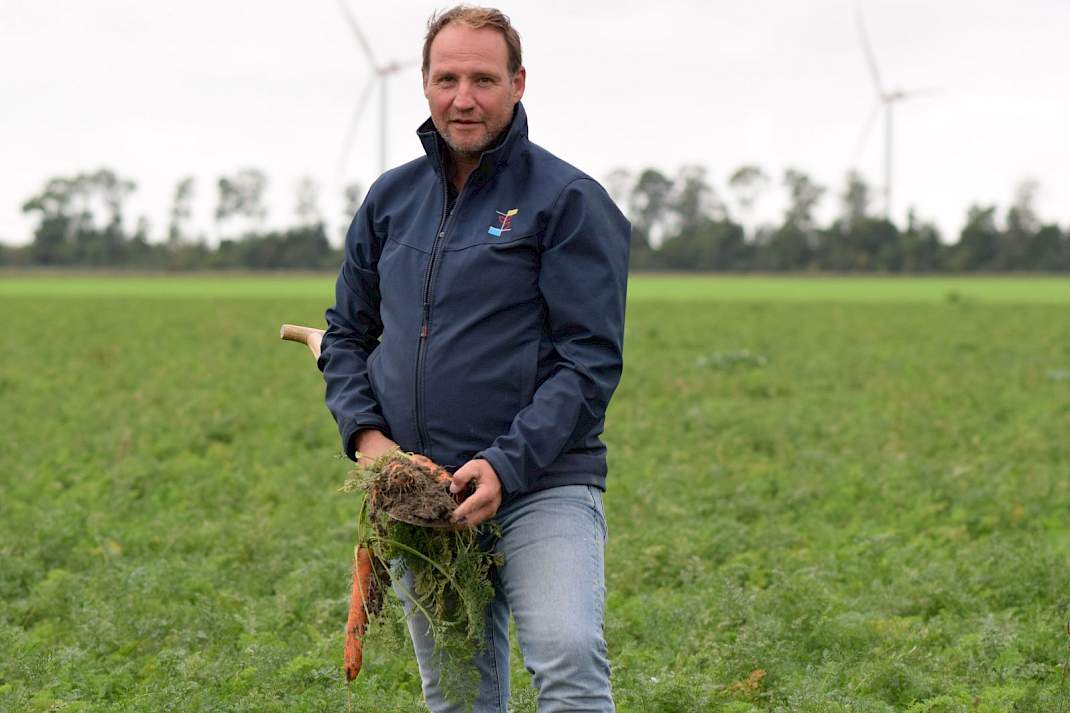 Christoffel den Herder in een perceel peen